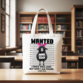 White tote bag with WANTED sheep graphic and Luke 15:10 scripture on front