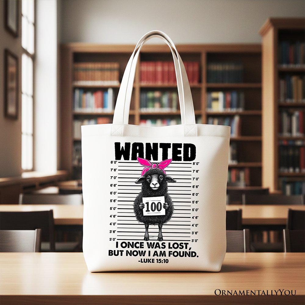White tote bag with WANTED sheep graphic and Luke 15:10 scripture on front