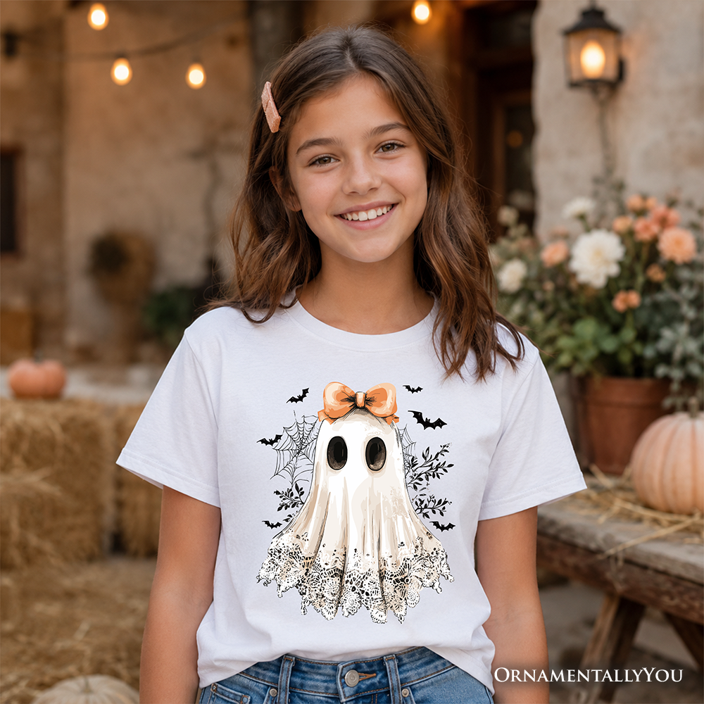 White kids T-shirt with centered ghost graphic, orange bow, bats, short sleeves