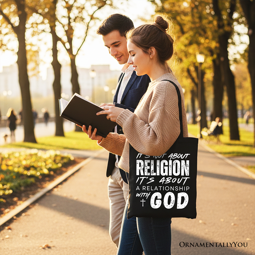 Black tote bag carried by a person, with white quote: it’s about a relationship with God.