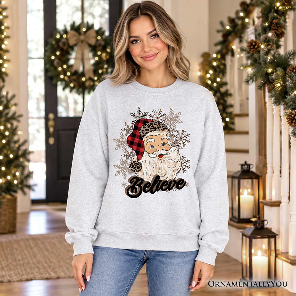 Heather gray crewneck sweatshirt with Santa face, snowflakes, and 'Believe' print