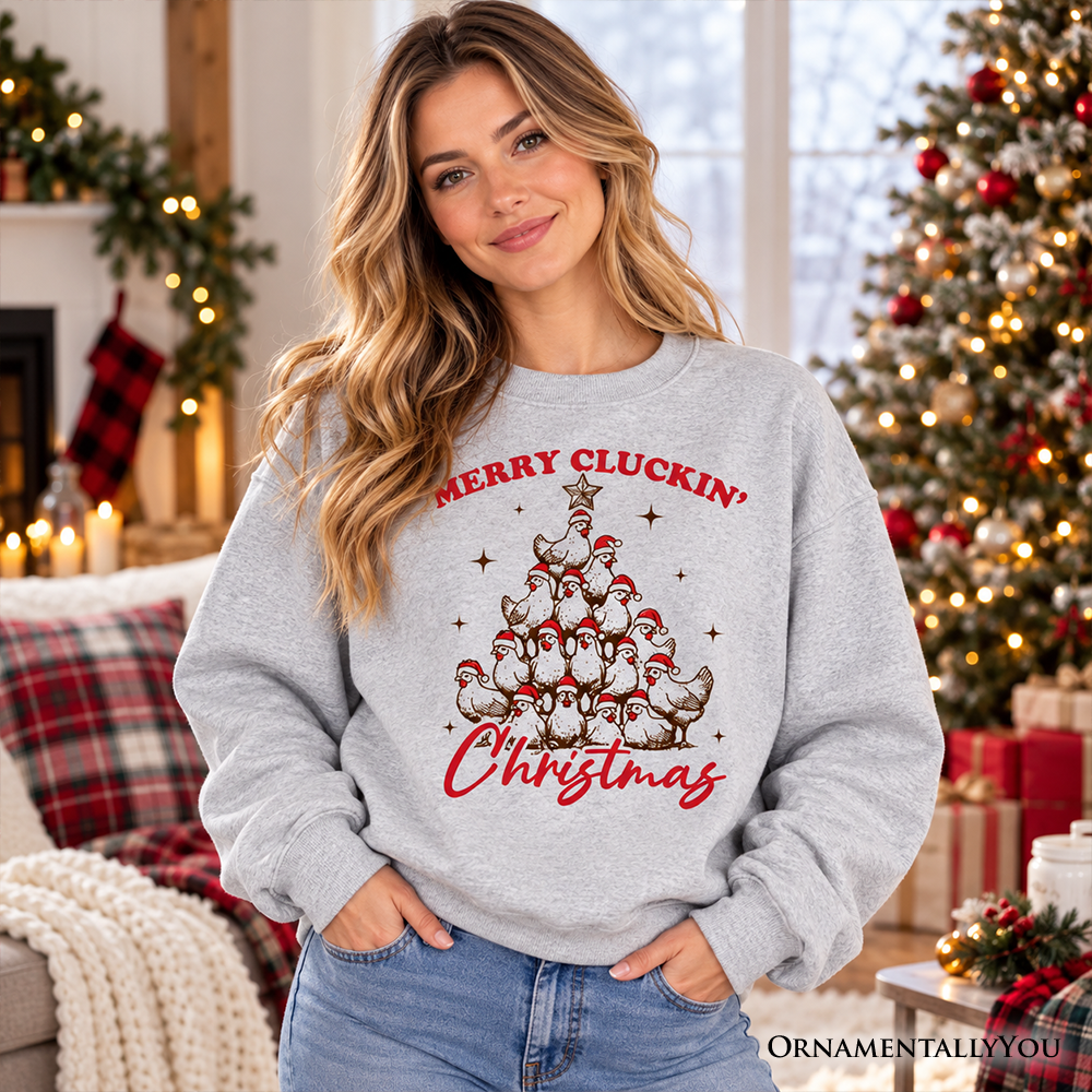 Ash gray Christmas crewneck sweatshirt with red "Merry Cluckin' Christmas" chicken tree graphic