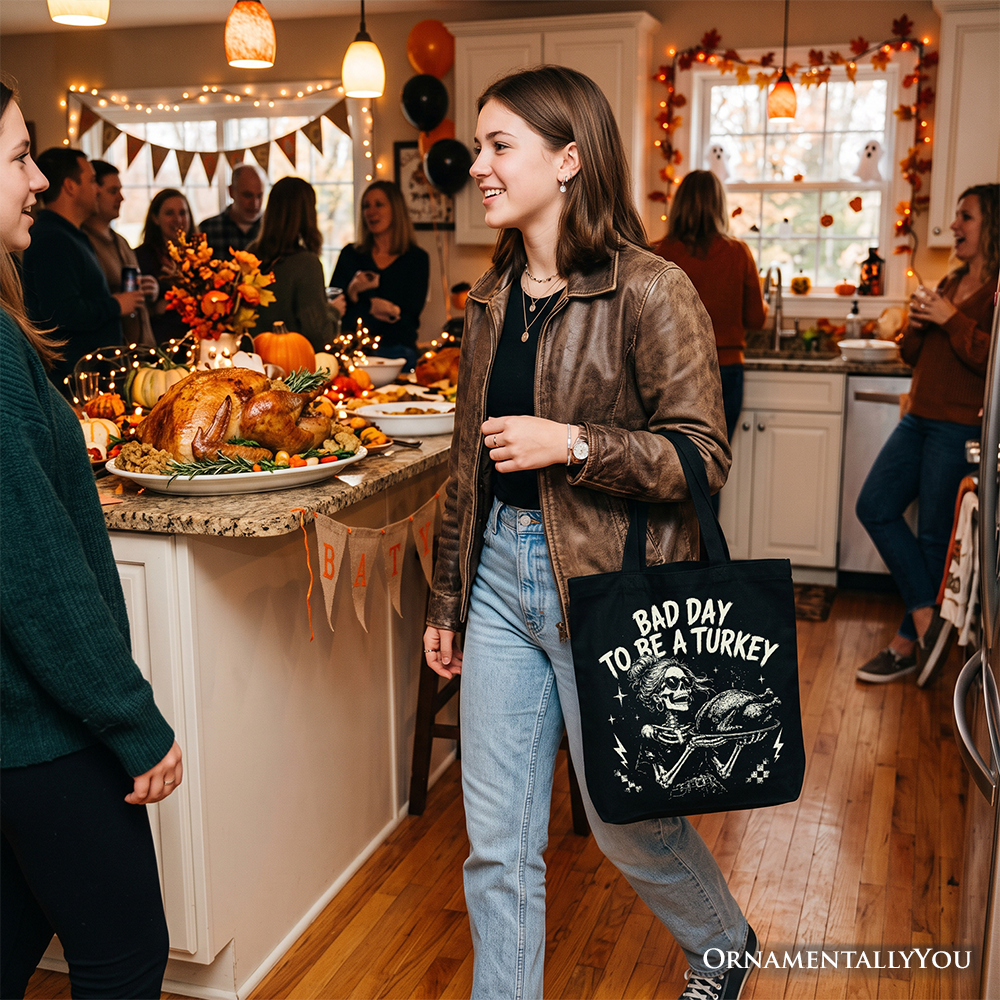 Black canvas tote bag with "Bad Day to Be a Turkey" skeleton graphic and handles