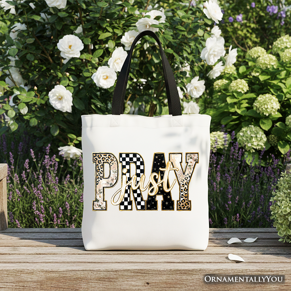 White tote bag with “Pray” patchwork graphic centered on the front