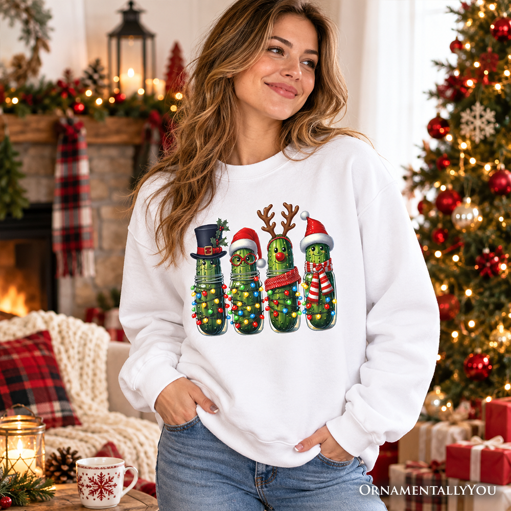 White crewneck sweatshirt with festive pickle character graphic on the front