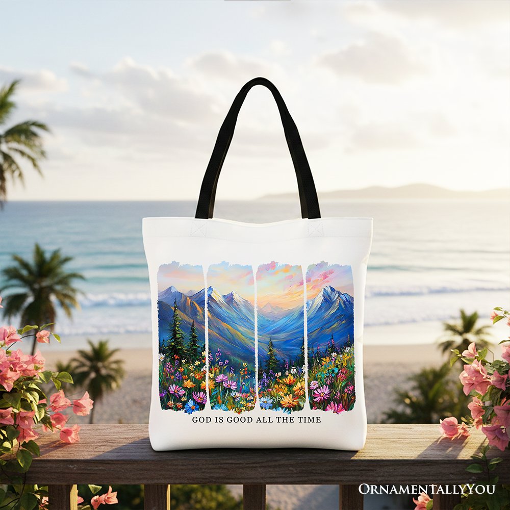 White canvas tote bag with black handles, mountain landscape bible verse print.