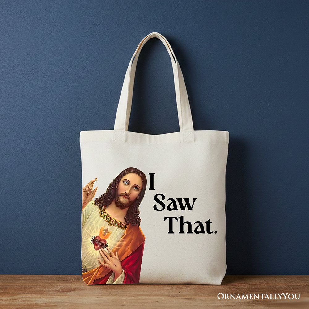 Canvas tote bag with light handles, Jesus portrait and “I Saw That.” text.