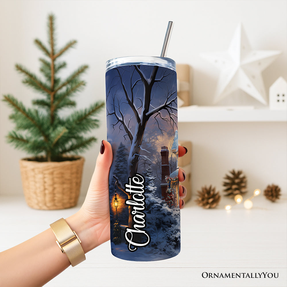 Blue winter house tumbler with lid and silver straw, "Celebrate" script on cup
