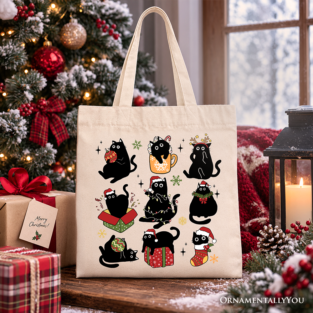 Cream tote bag with black cat holiday illustrations, Santa hats, and top handles