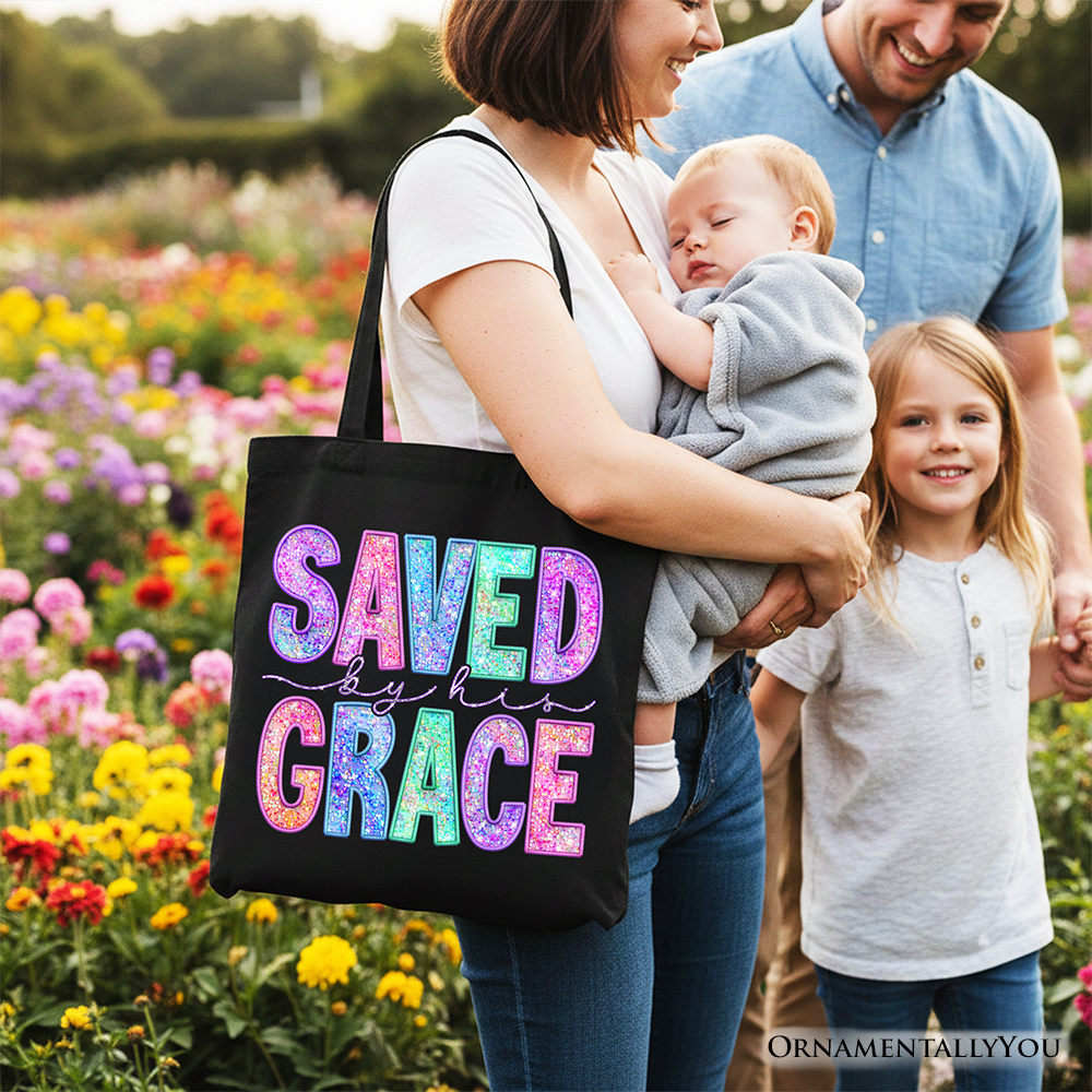 Black tote bag with faux sequin 'Saved by Grace' front design and twin handles