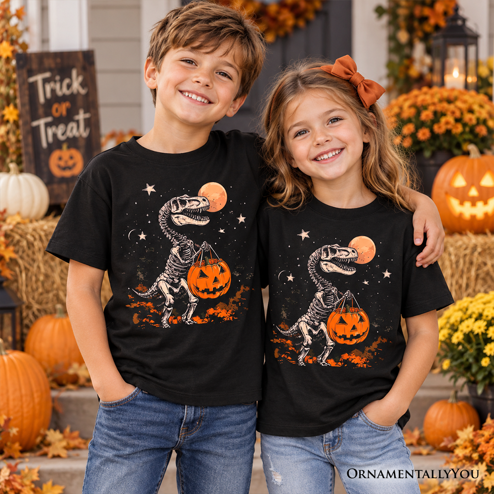 Two kids wearing black crew-neck T-shirts with dinosaur skeleton and pumpkin graphic