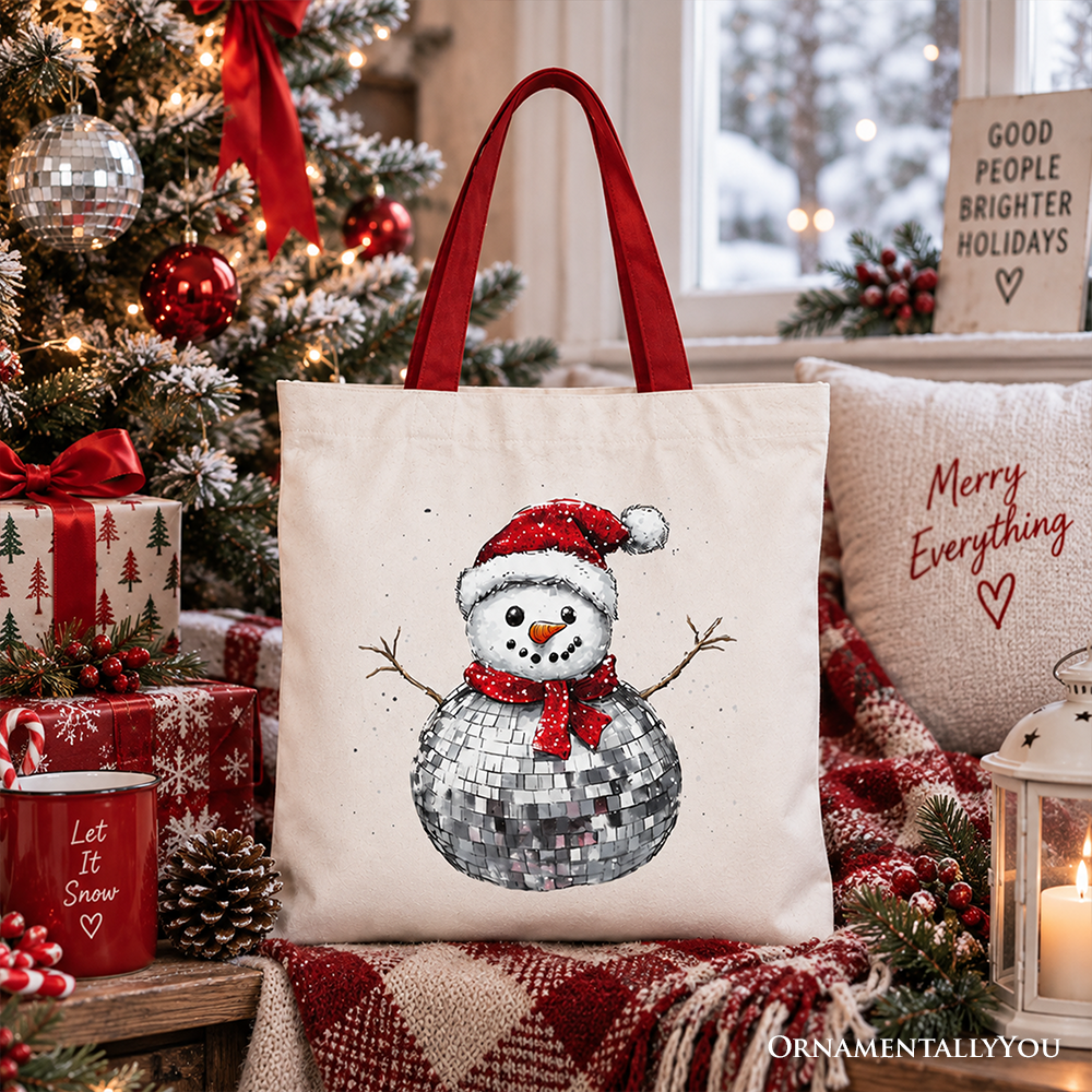 White tote bag with disco snowman graphic and red handles