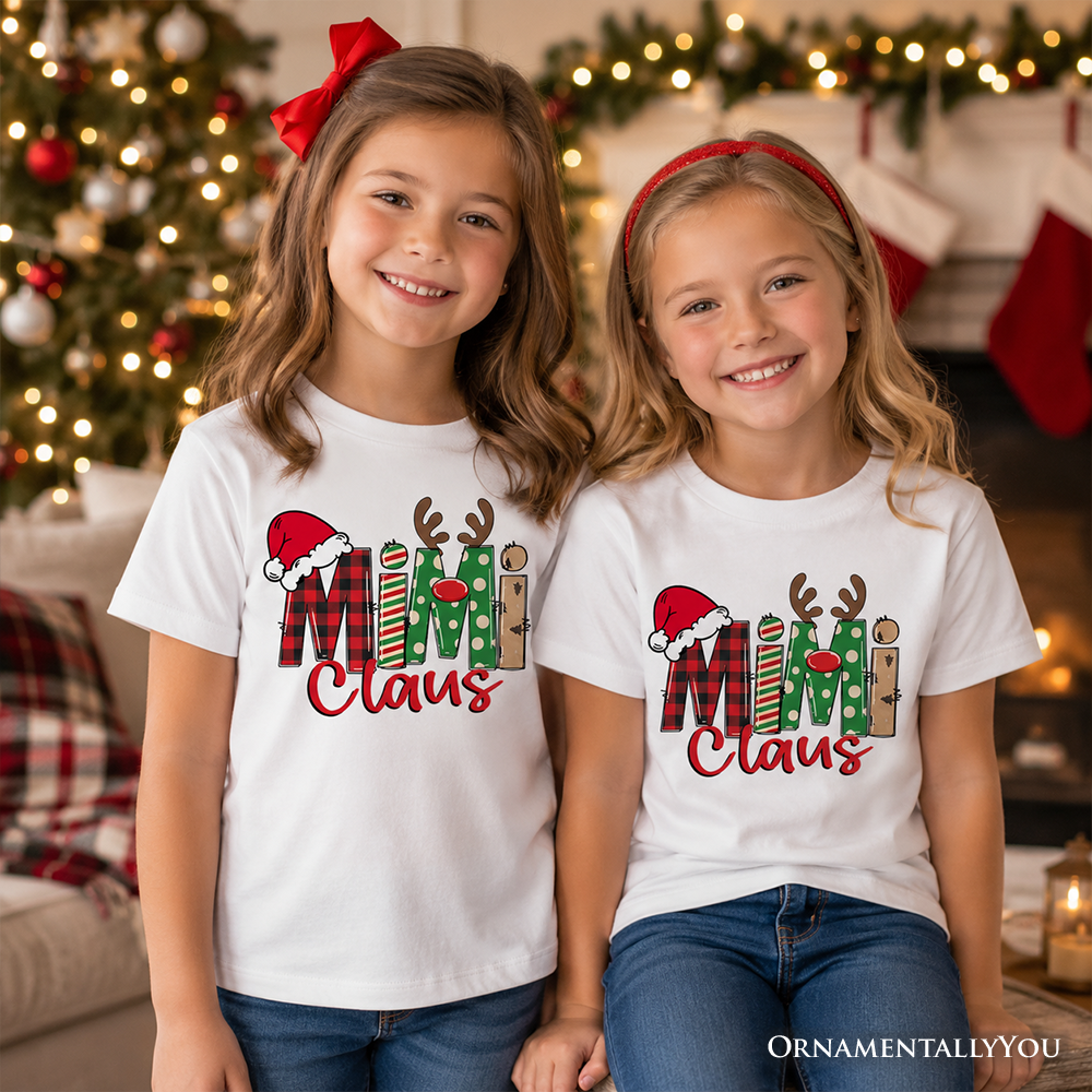 White kids T-shirt with Santa and Christmas block “Claus” graphic, worn by two children