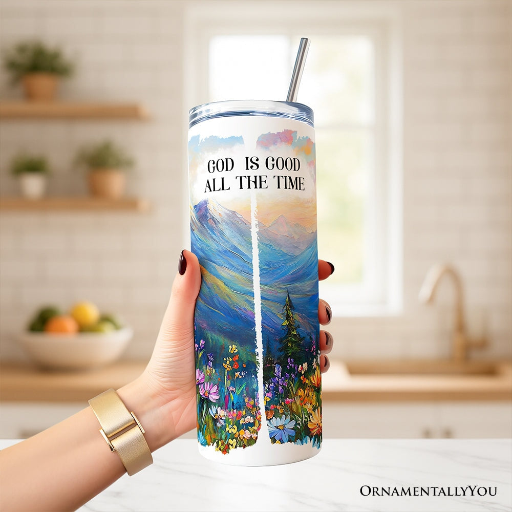 20oz personalized tumbler with lid and metal straw, mountain and flowers design, held in hand