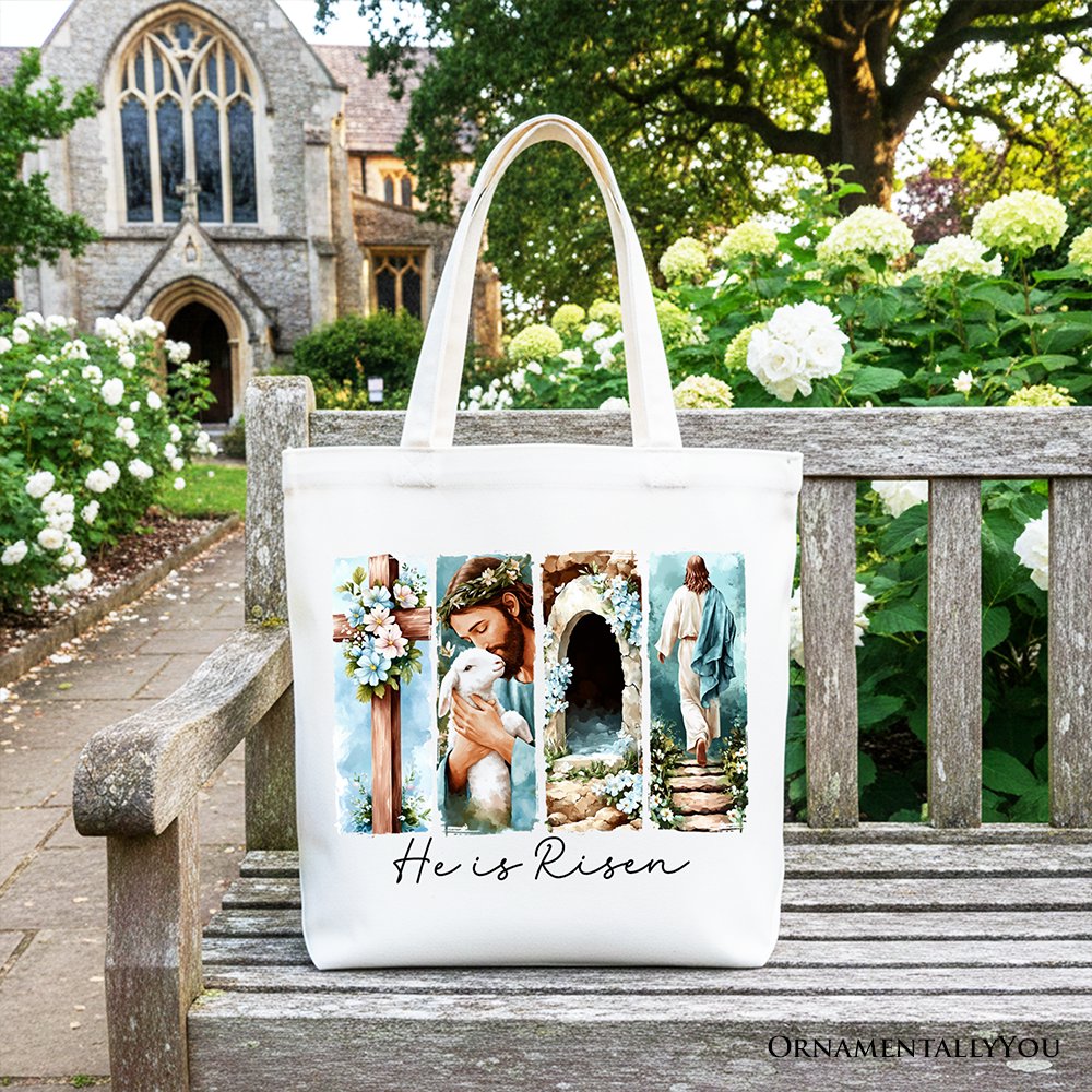 White canvas tote bag with floral arch collage and "He Is Risen" script on front.