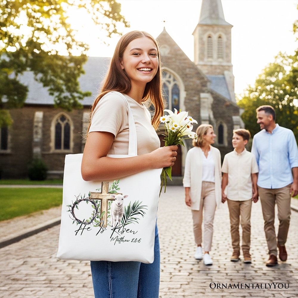 White Christian Easter tote bag with cross, lamb, and Matthew 28:6 verse print