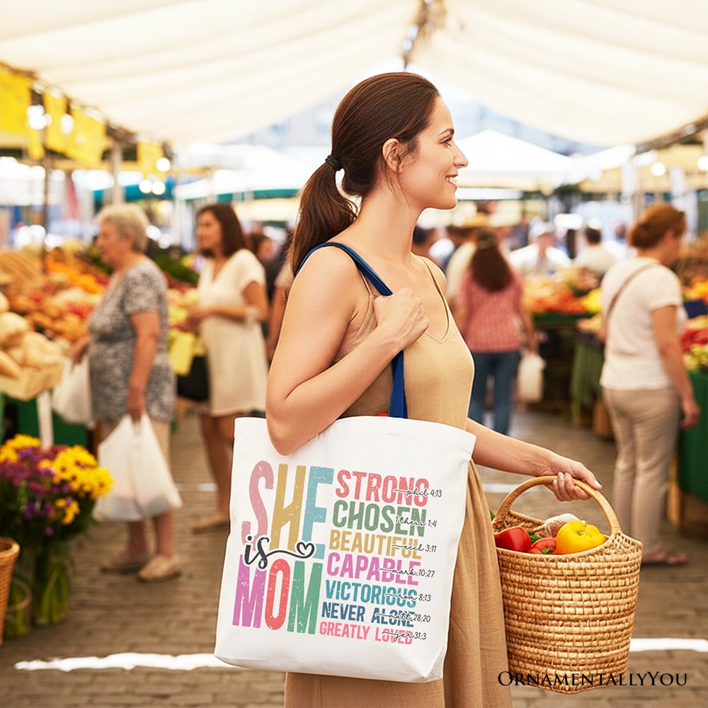White canvas tote bag with navy handles and colorful affirmation graphic on front