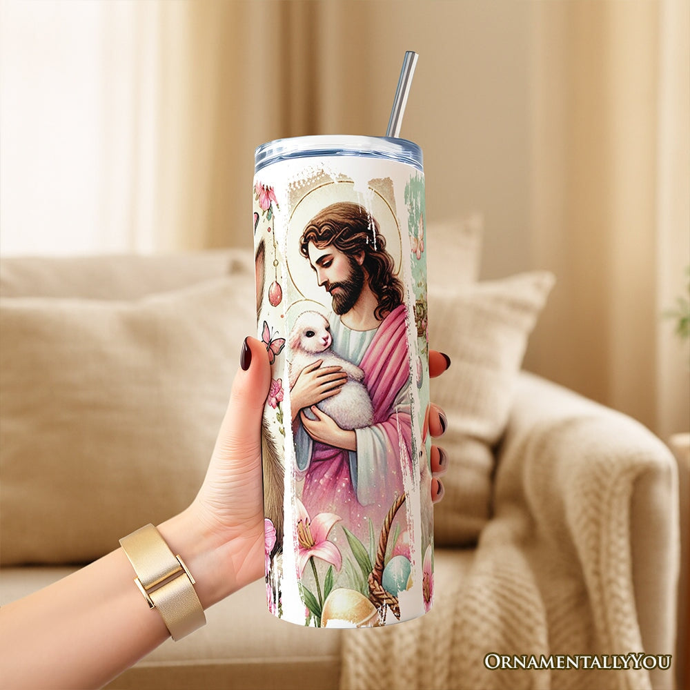 Easter Jesus and rabbit tumbler with lid and stainless straw, held in hand