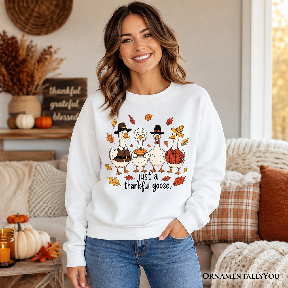 White sweatshirt with “just a thankful goose” turkey graphic