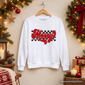 White crewneck sweatshirt with centered red “Merry” script and black checkered print
