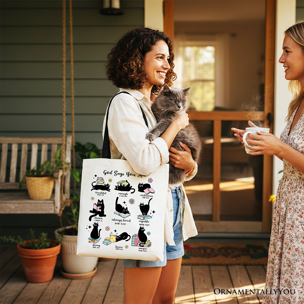 White tote bag with cat collage and scripture-style wording on the front