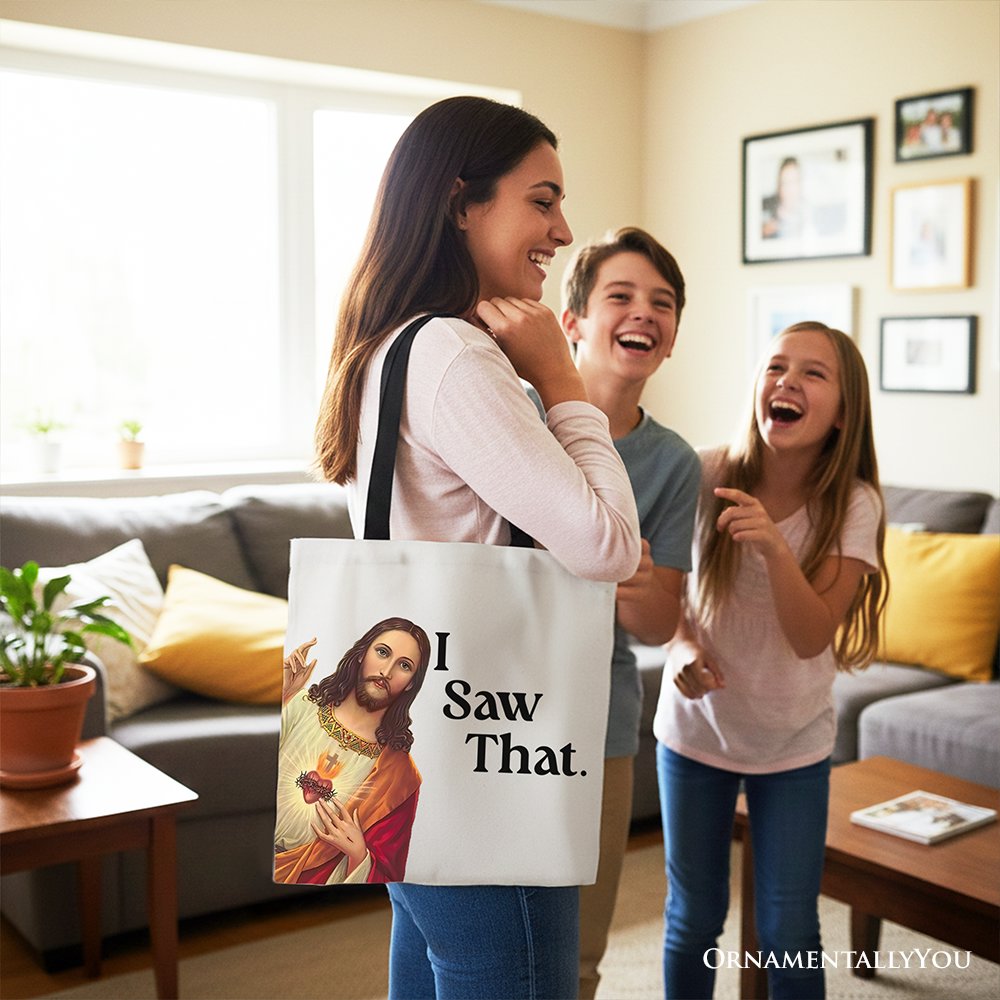 Canvas tote bag with Jesus portrait and “I Saw That.” text, carried in a room.