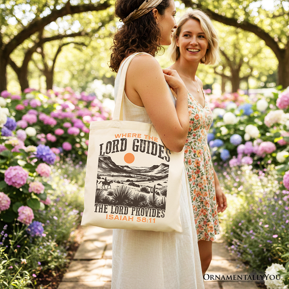 Cream tote bag with desert graphic and 'The Lord Provides' Isaiah 58:11, front