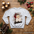 Light gray crewneck sweatshirt with Santa face, snowflakes, and 'Believe' print