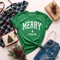 Kids Irish green Christmas T-shirt flat lay with white 'MERRY COUSIN' graphic
