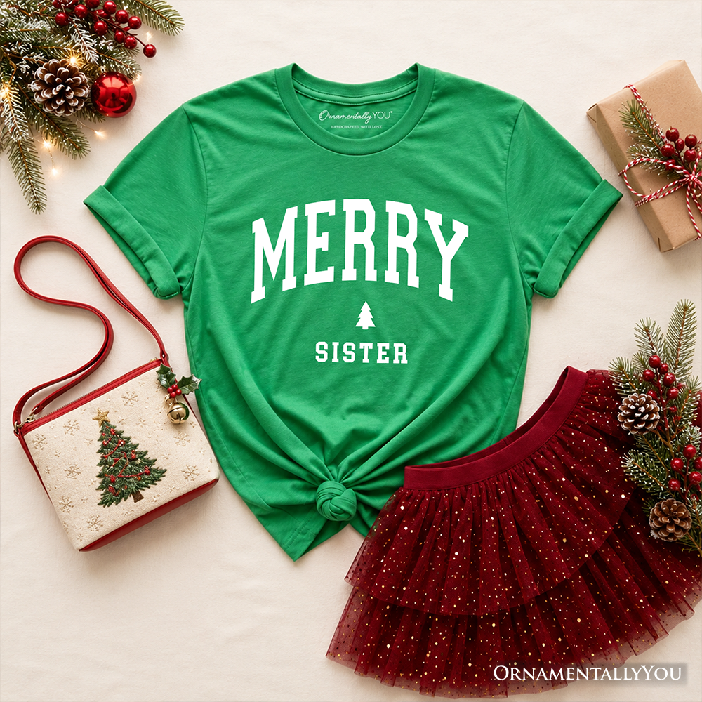 Kids green Christmas T-shirt with “MERRY SISTER” and tree graphic, knotted front