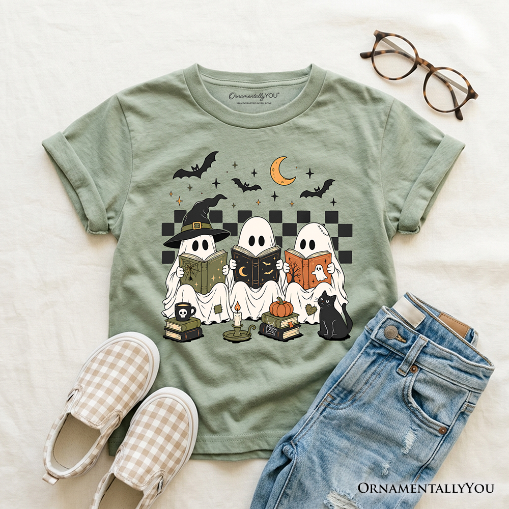 Kids sage green T-shirt with ghost characters, witch cat, moon, and book graphic