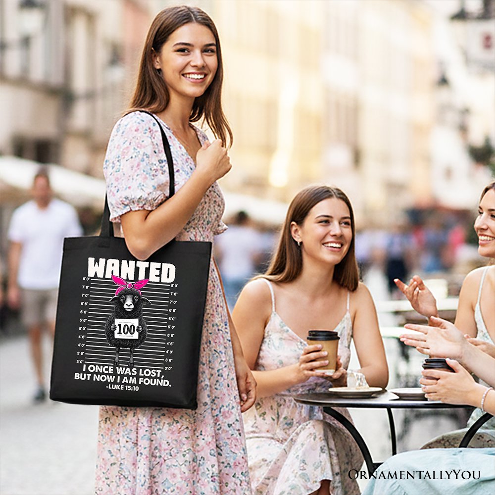 Black tote bag with WANTED sheep graphic and Luke 15:10 verse text