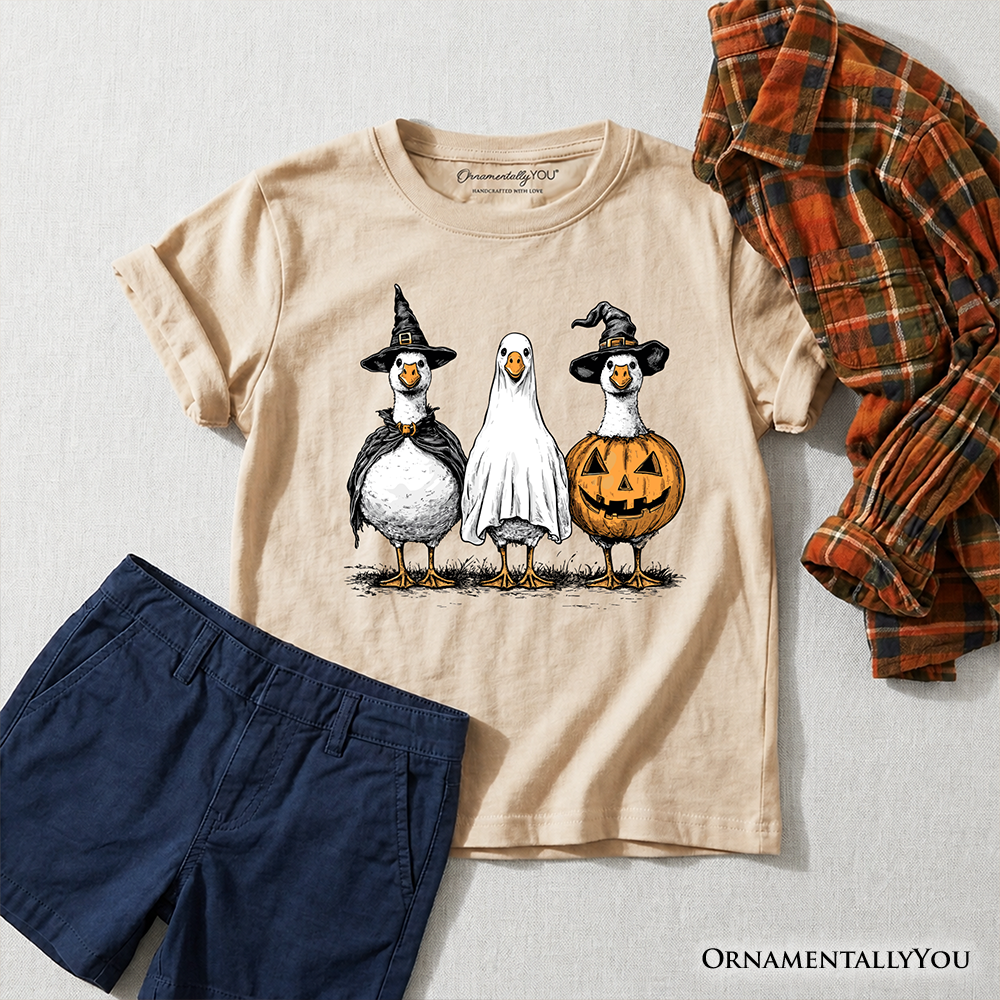 Kids sand Halloween T-shirt with penguin trio graphic and jack-o-lantern