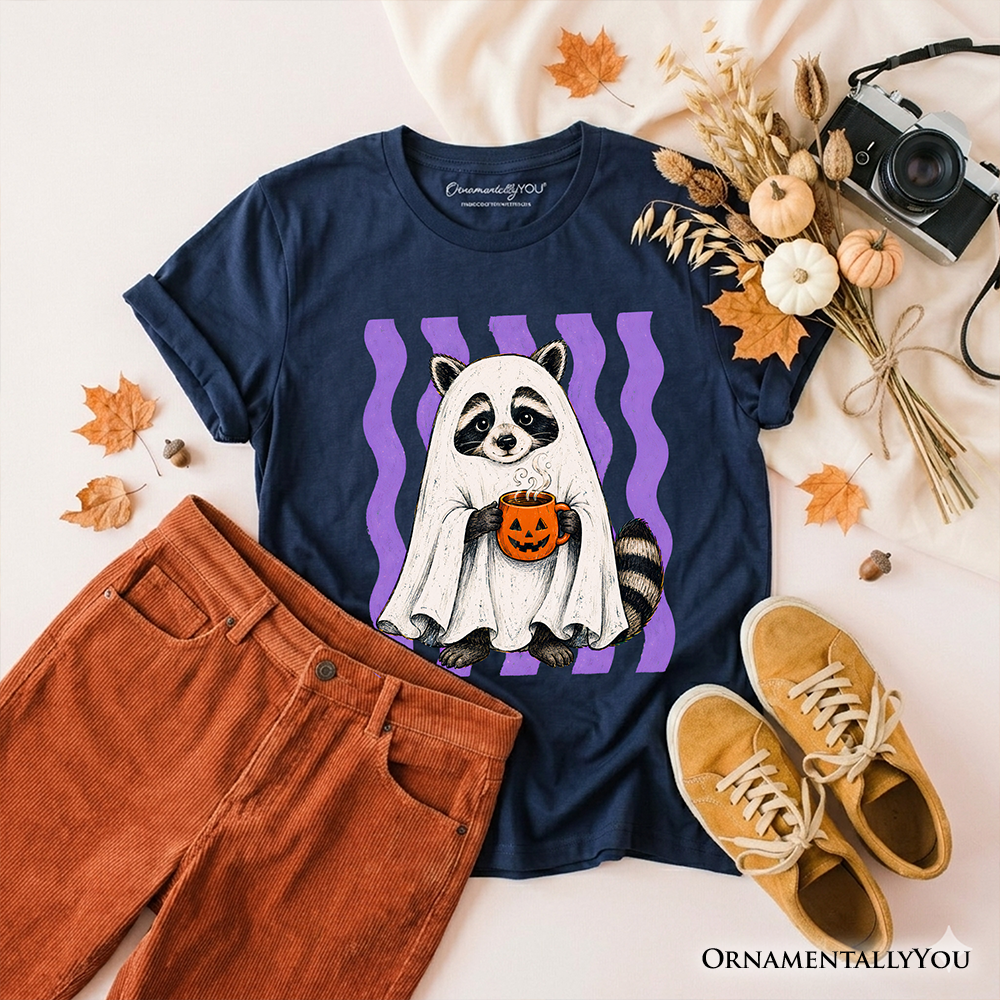 Kids Halloween raccoon ghost pumpkin T-shirt, dark navy flat lay with accessories