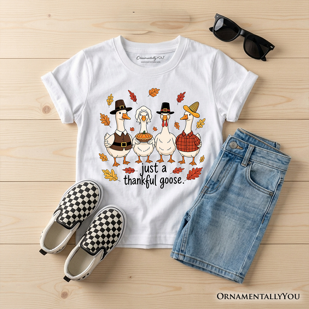 Kids white crew-neck T-shirt with turkey family graphic and “just a thankful goose”