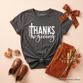 Kids T-shirt in dark gray with "THANKS giving" cross graphic and front knot
