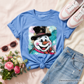 Carolina blue kids t-shirt flat lay with glitter snowman face graphic