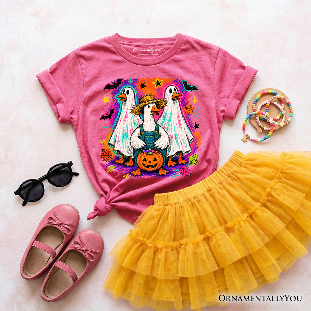 Kids Halloween t-shirt in pink with colorful geese and jack-o'-lantern graphic, tied front