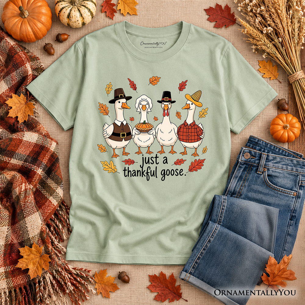 Kids sage green crew-neck T-shirt with turkey family graphic and “just a thankful goose”