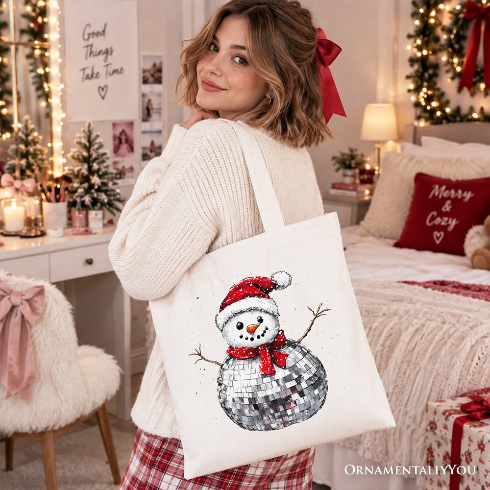 White tote bag with disco snowman graphic and light-colored handles