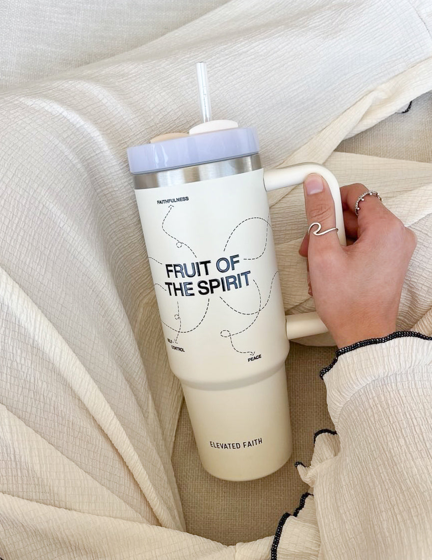 30 oz cream tumbler with clear straw and silver lid, white handle, 'Fruit of the Spirit' design