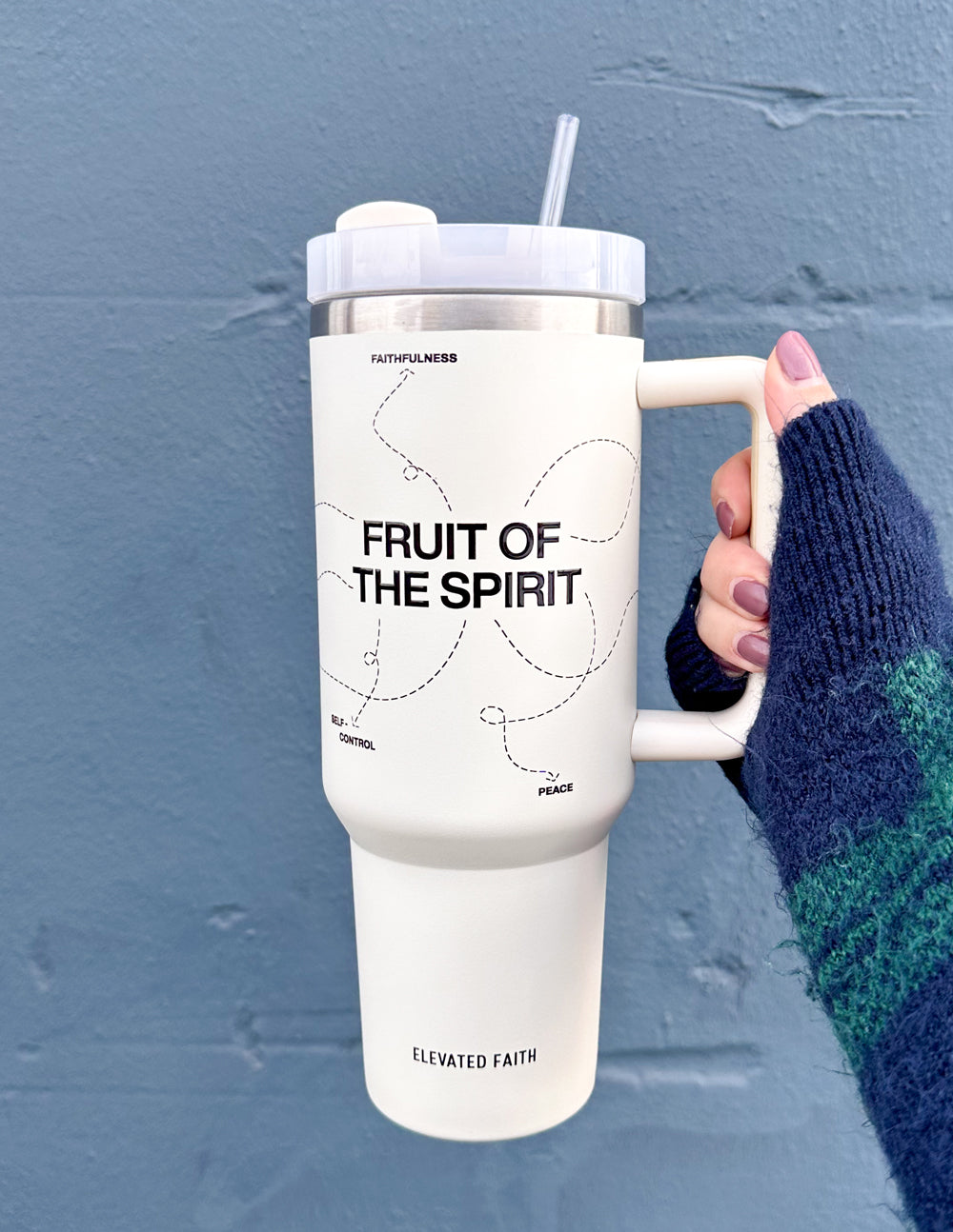 White 40 oz tumbler with straw and handle; silver lid, 'FRUIT OF THE SPIRIT' wording