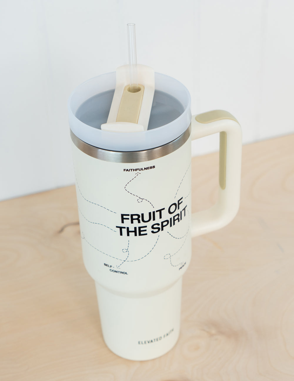 White 40 oz tumbler with handle, silver lid, straw; 'FRUIT OF THE SPIRIT' text