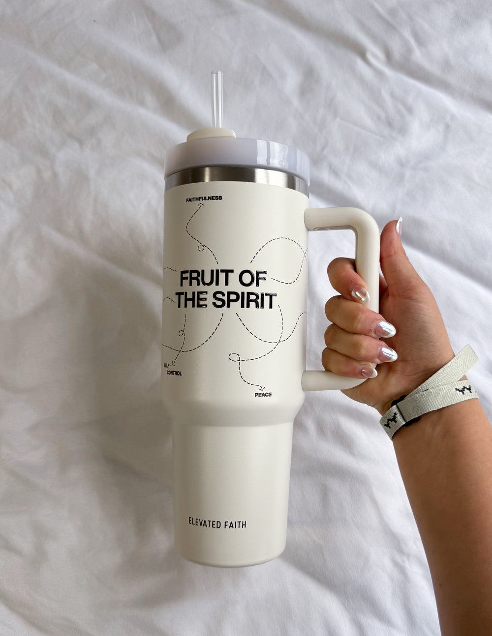 White 40 oz tumbler with handle, straw, and silver lid; 'FRUIT OF THE SPIRIT' text
