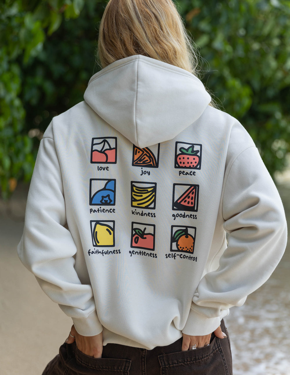 Unisex white hoodie, back view with hood down and colorful square icon grid print