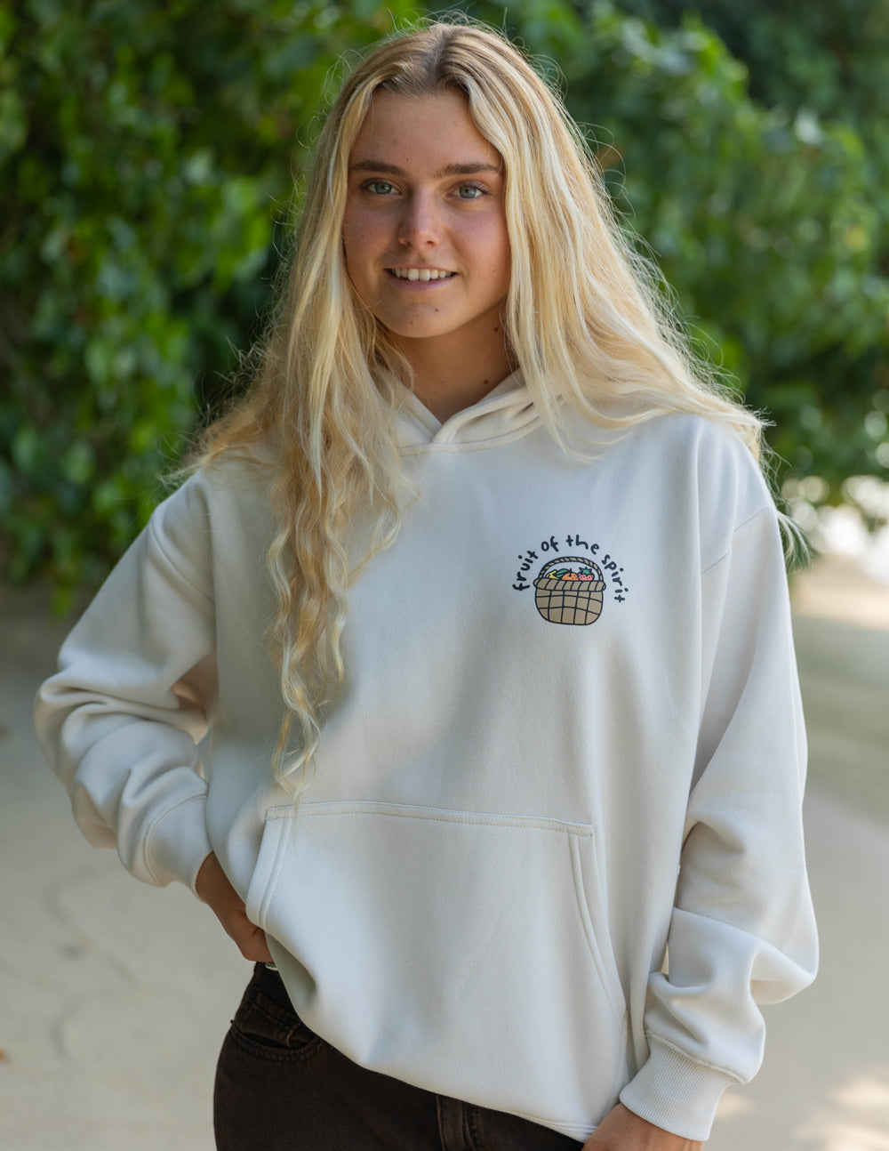 Unisex white hoodie, front globe-in-heart emblem and kangaroo pocket