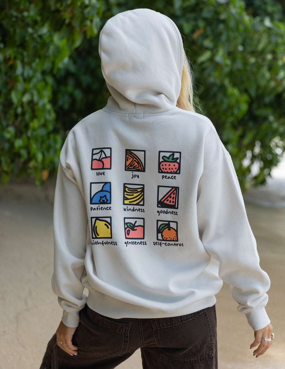 Unisex white hoodie, hood up, back square icon grid print