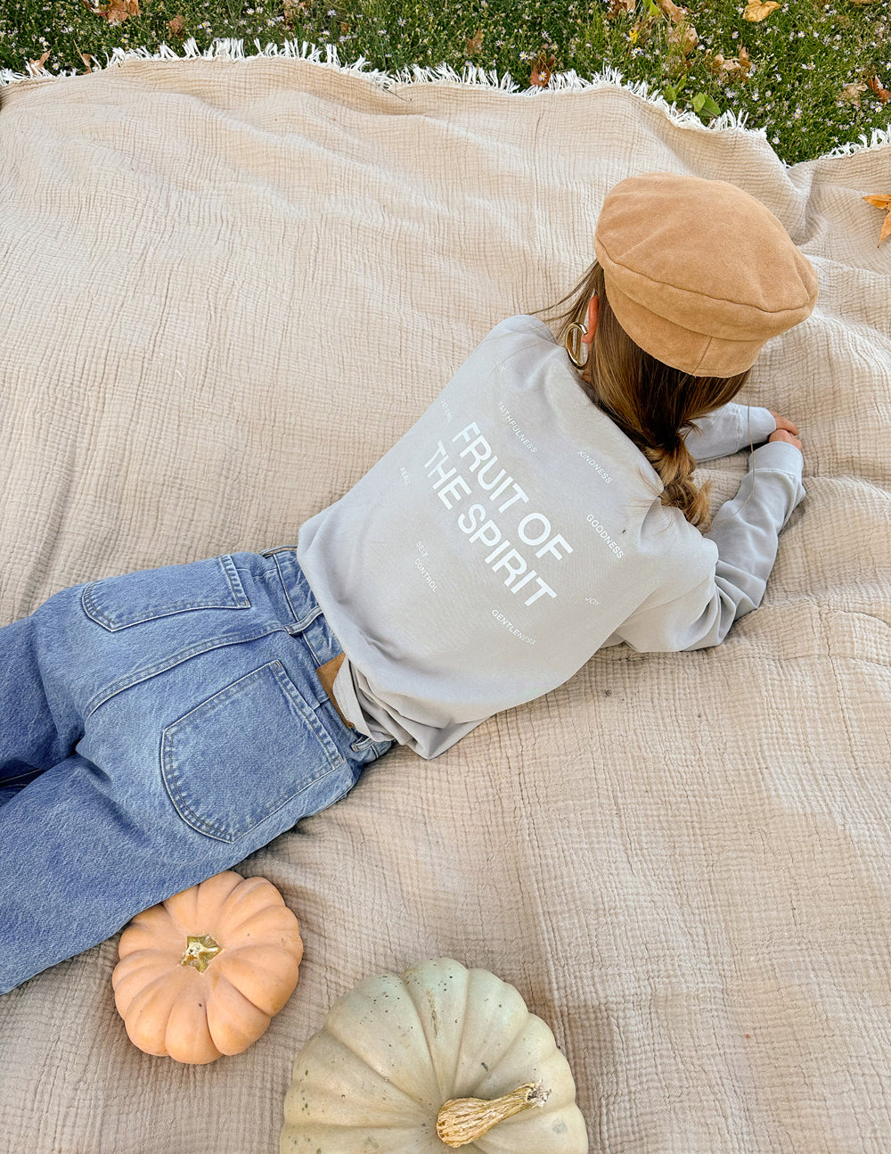 Grey long-sleeve T-shirt with “FRUIT OF THE SPIRIT” print on the back.