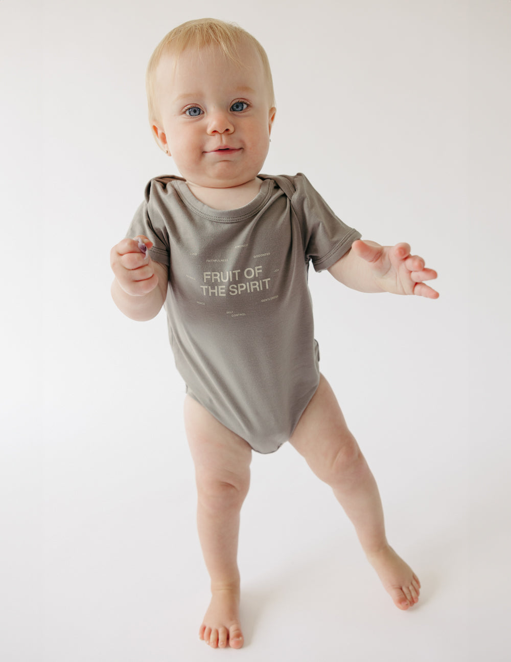 Taupe baby bodysuit with 'Fruit of the Spirit' front print and short sleeves
