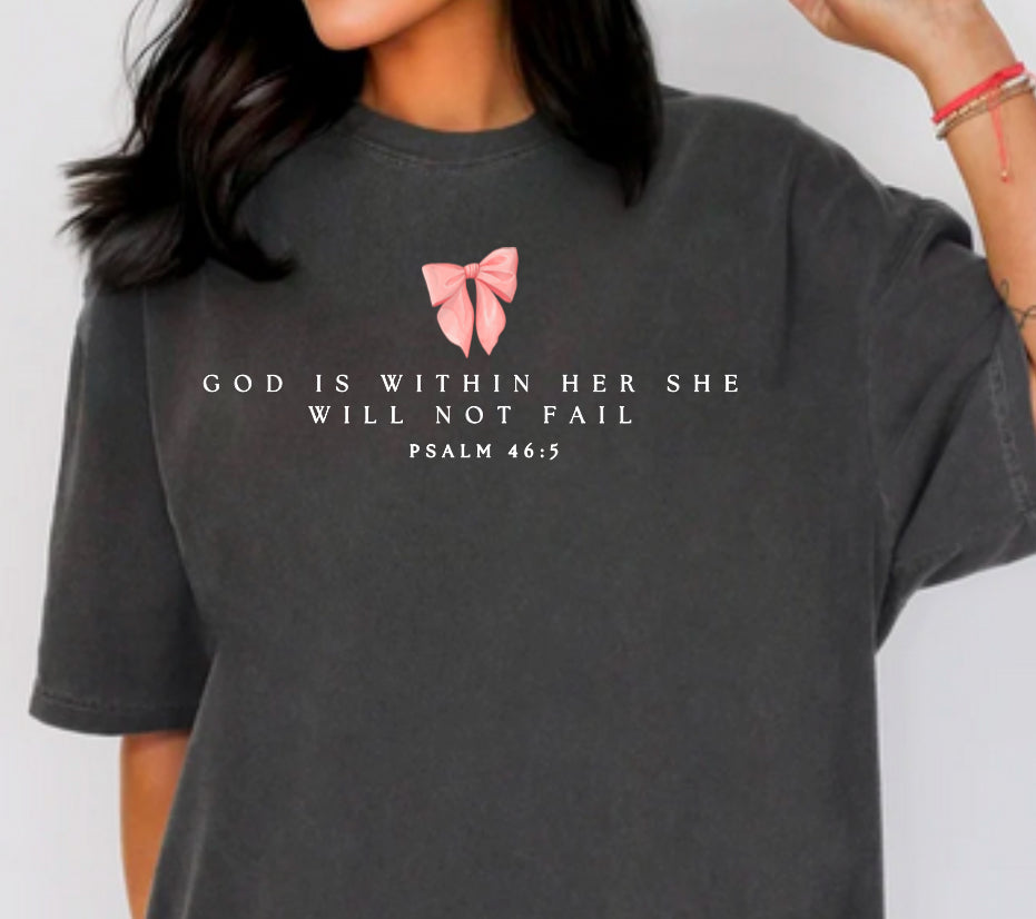 Dark gray women's graphic T-shirt with Psalm 46:5 text and pink bow logo